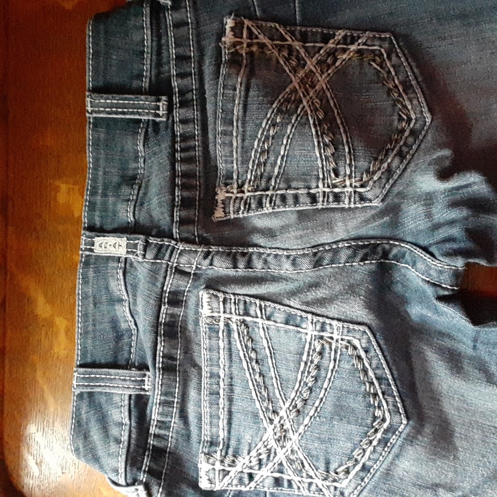Pair of ariat denim boot cut jeans size 26
